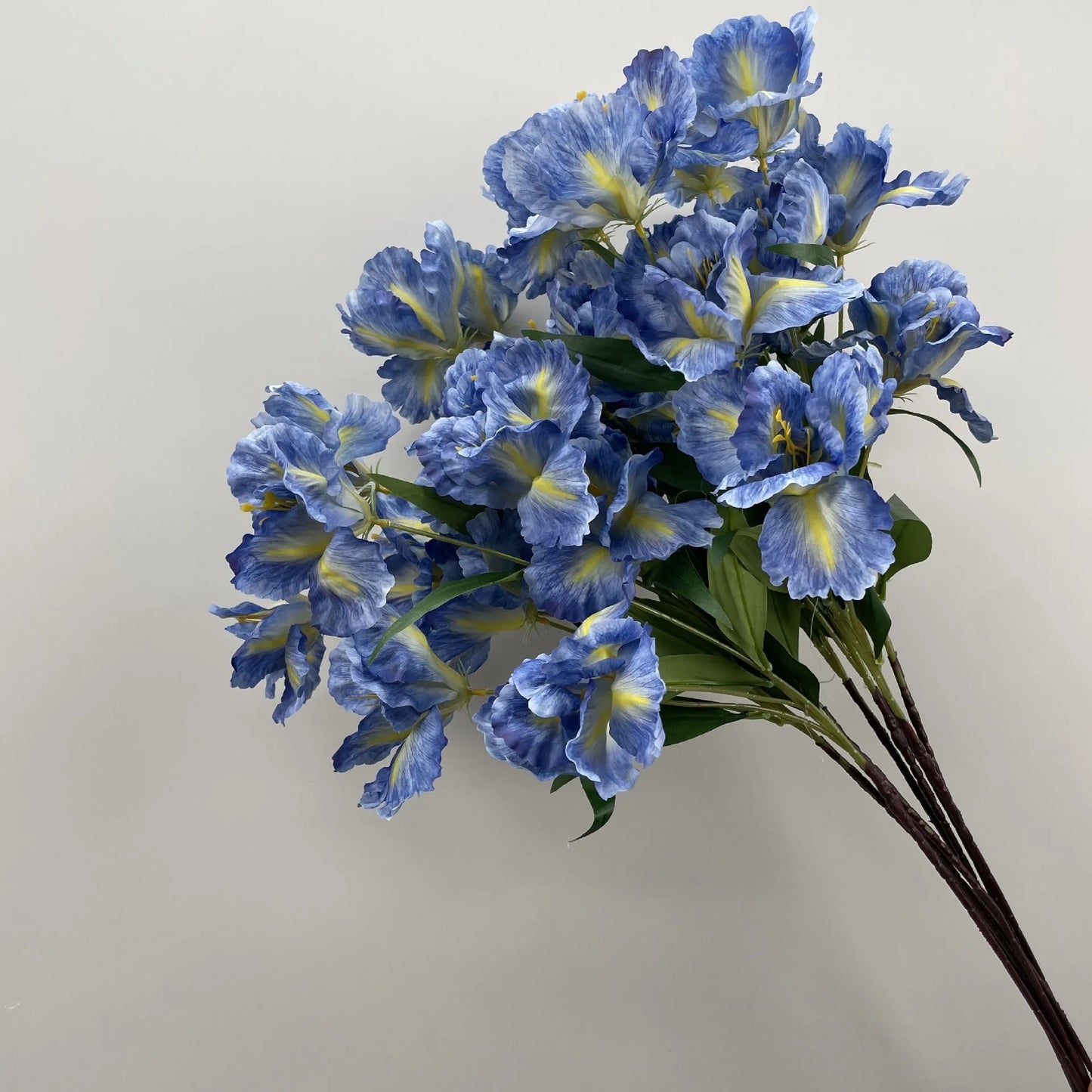 Haze blue silk flower bouquet with campanula, linglan, and wildflowers for home decoration
