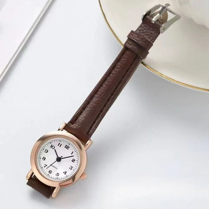 Retro round watch with 26mm dial, 8mm alloy case, and imitation leather strap with pin buckle