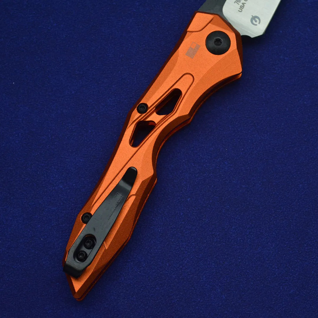 Black folding fruit knife with D2 steel blade and aluminium handle, shown open with length scale.