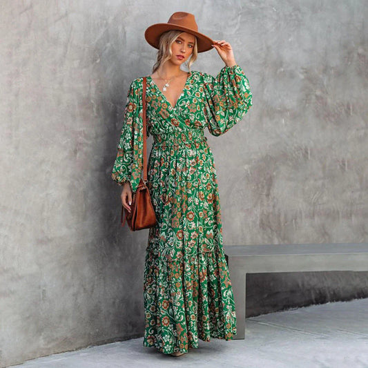 Elegant green printed halter dress with flared sleeves, made of high-quality polyester fabric