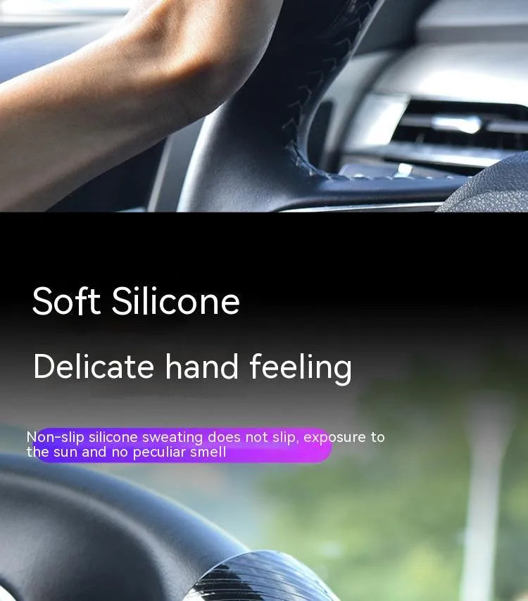 Black steering wheel assist ball with silicone grip mounted on car steering wheel