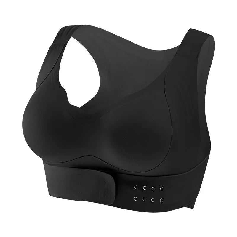 Front buckle closure on a black women's yoga bra with fixed double shoulder straps and a 3/4 cup.