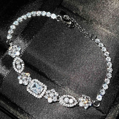 Women's adjustable silver-plated bracelet with zircon stones on geometric links