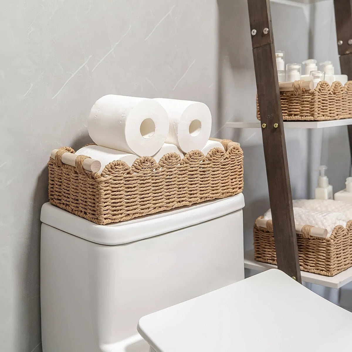 Woven paper storage basket in khaki colour, dimensions 35.5x16x10cm, on a desktop with remote controls and stationery