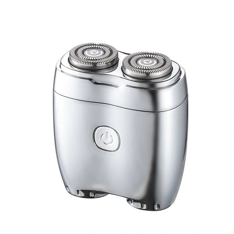 Silver portable electric shaver with floating double cutter heads, USB charging port, and rubberised grip