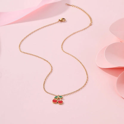 Cherry jewellery set with necklace, bracelet, earrings and ring in gold electroplated stainless steel with geometric fruit design