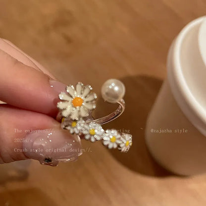 Women's copper opening sweet twin ring set showing little daisy pearl and little daisy ring designs