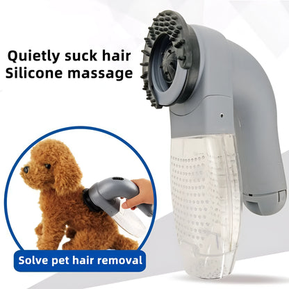 Grey handheld electric pet hair remover brush with soft rubber head for grooming dogs and cats.