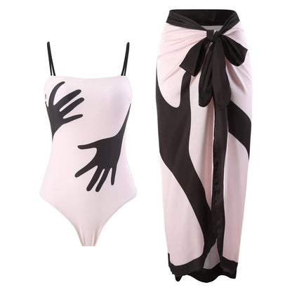 Women's one-piece bikini swimsuit with a white tulle skirt overlay on a mannequin.