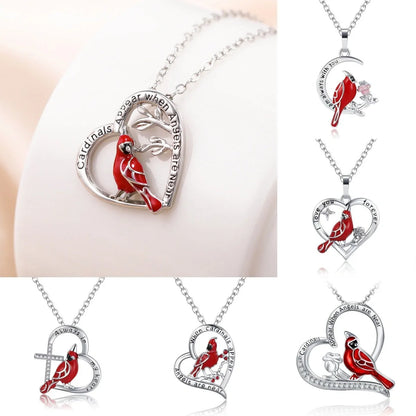 Elegant heart-shaped cardinal pendant necklace with a silver finish, perfect for gifting.