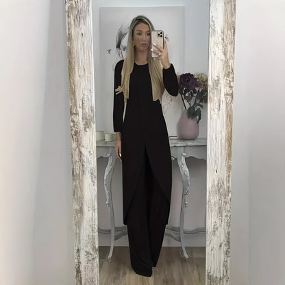 Black loose-fit polyester two-piece lounge set with long sleeves and matching trousers
