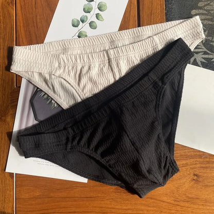 Men's solid colour pure cotton triangle underwear briefs on a mid-waist fit model