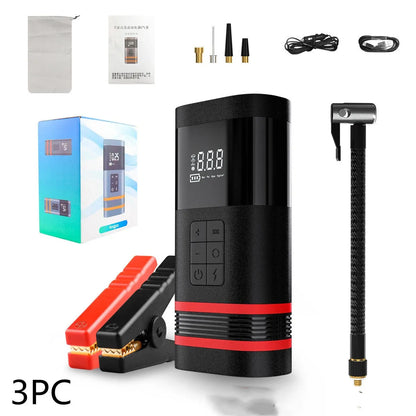 Black wireless portable 100W car jump starter power bank with jumper pins and charging cables on a table.