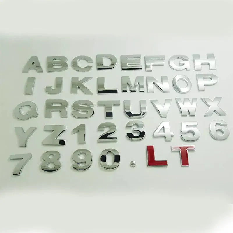 Metal zinc alloy car bumper sticker letters showing 3D design in black and silver finishes