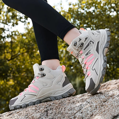 High-top hiking shoes in flannel with natural rubber sole, shown in colour options for outdoor wear.