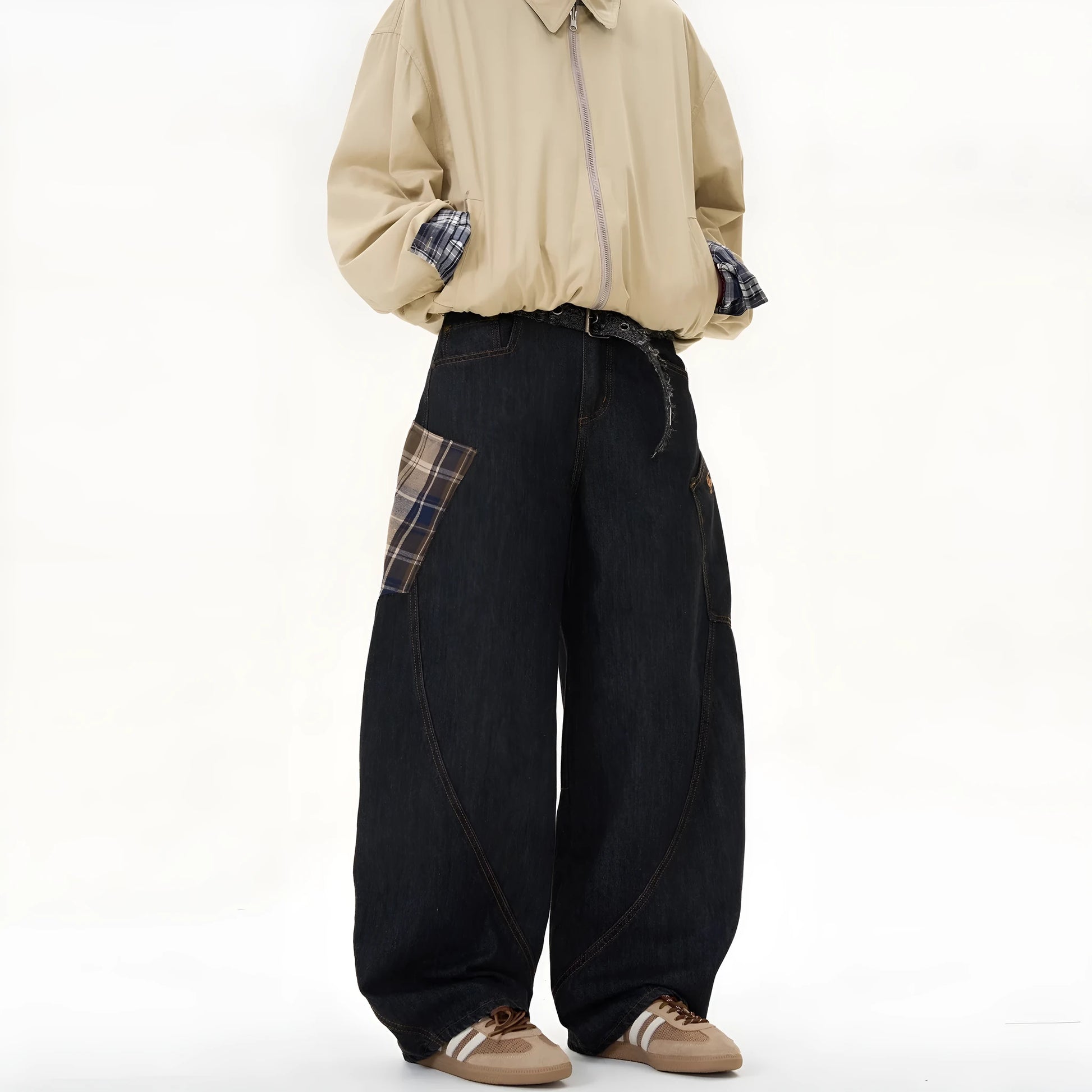 Loose straight-leg cotton trousers in a red plaid pattern, laid flat.