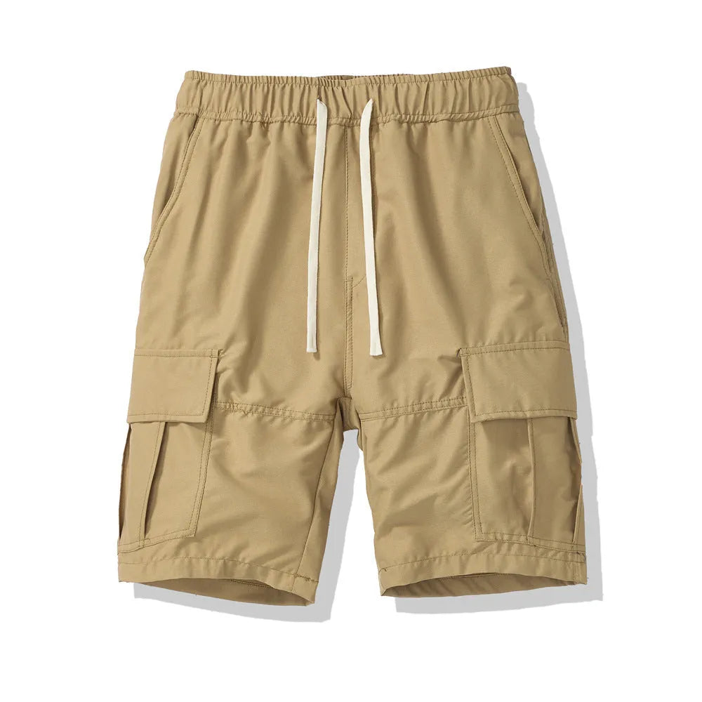 Men's loose cropped pants in Korean style with multiple pockets, shown in brick red colour