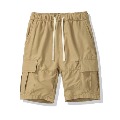 Men's loose cropped pants in Korean style with multiple pockets, shown in brick red colour