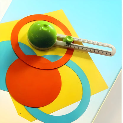 Orange plastic round paper cutter with rotating blade for A3 documents and juvenile use