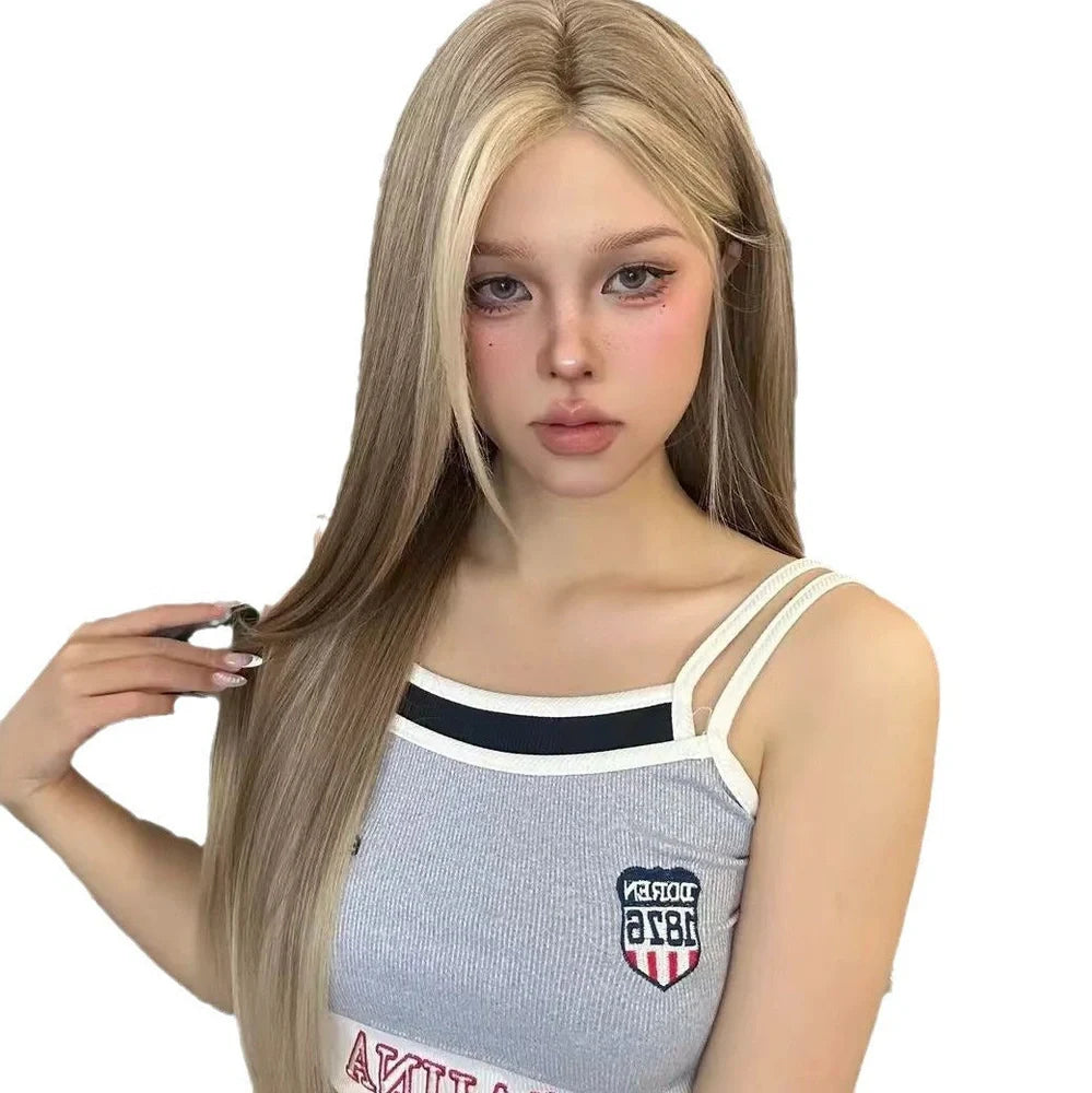 Forehead lace wig with golden brown gradient colour and centre-parted style on display