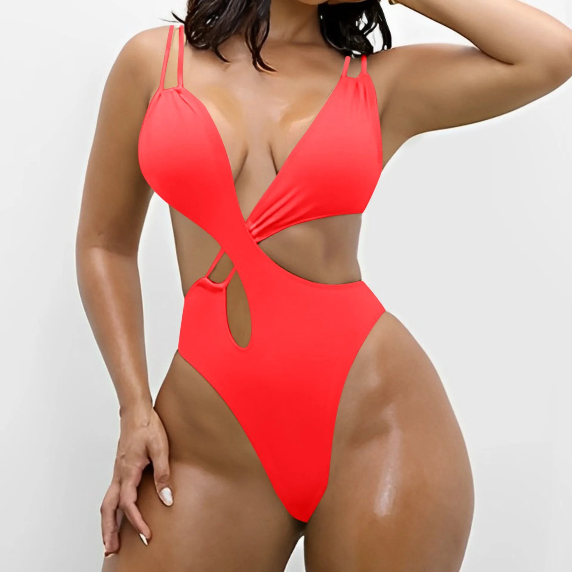 Women's one-piece triangle swimsuit bikini in a solid colour with a backless design.