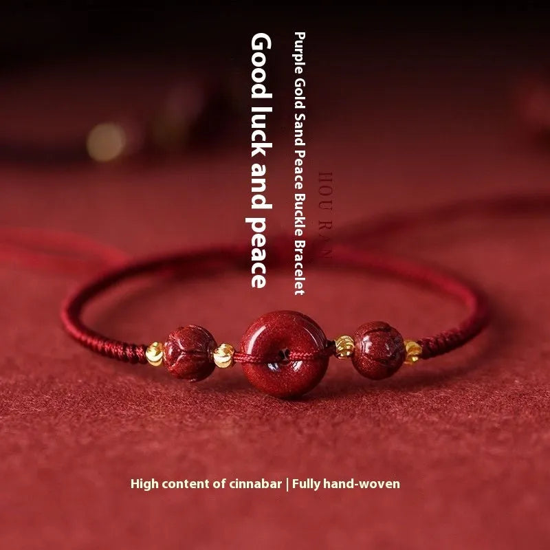 Cinnabar heart-shaped bracelet with safety buckle closure and adjustable coloured rope in traditional Chinese design