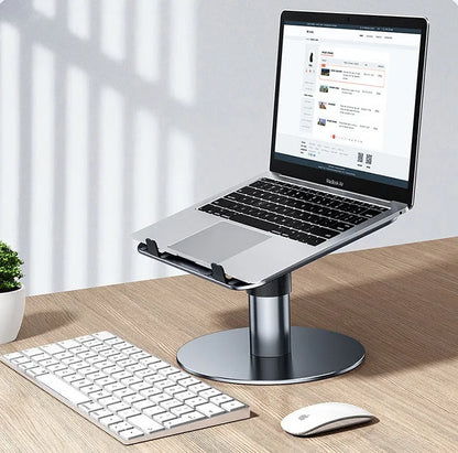 Silver adjustable aluminium car laptop stand with rotating base shown supporting a laptop.