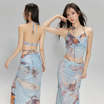 Women's blue printed triangle bikini set with skirt, showing steel support push-up top.