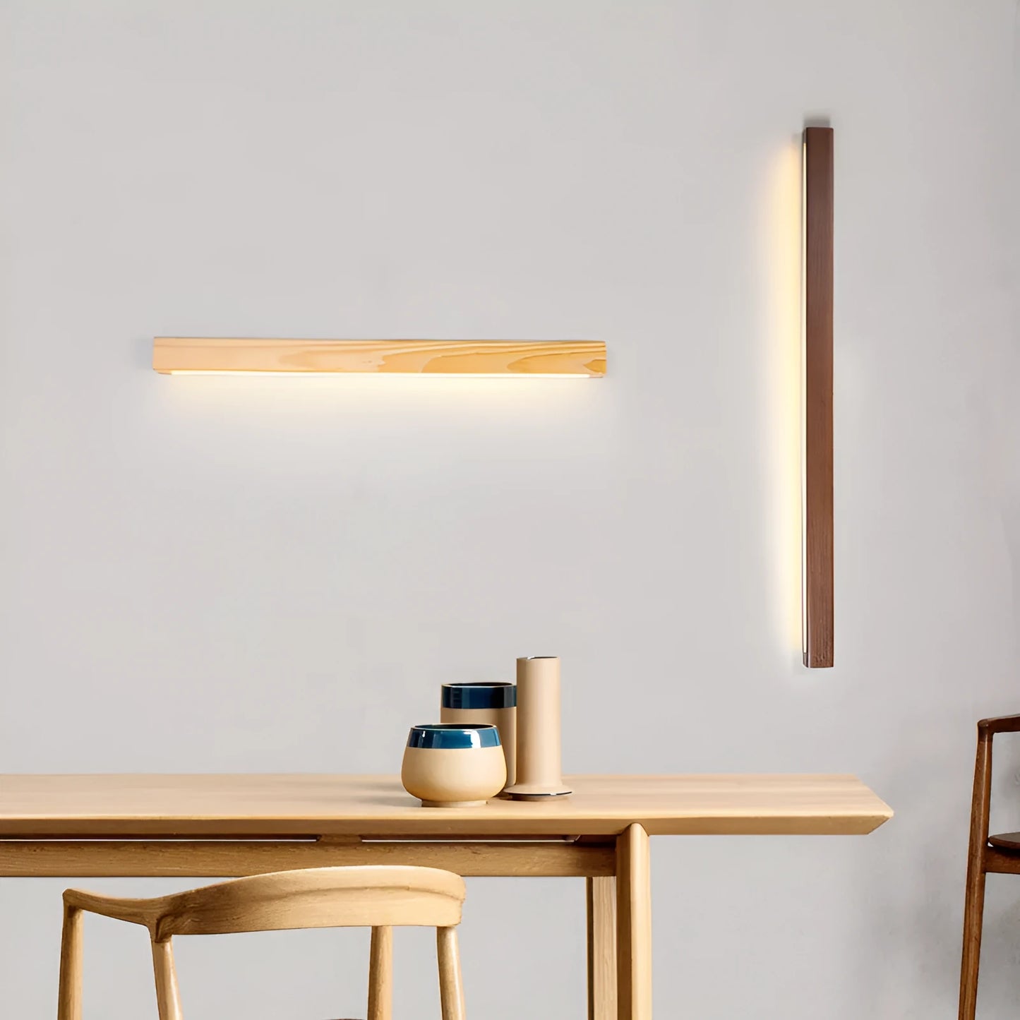 Walnut coloured wooden strip wall lamp with acrylic diffuser, mounted flush on a wall.