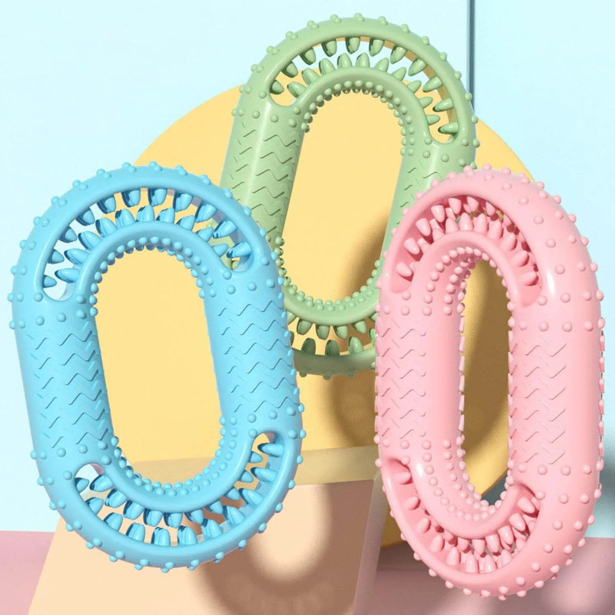 Blue O-ring shaped durable dog chew toy for aggressive chewers on a white background.