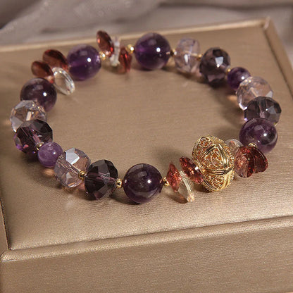 Purple crystal bracelet with pumpkin beads and rhinestone decoration