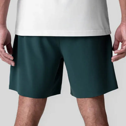 Men's seamless grey sports shorts in straight leg, knee-length quick-dry polyester design.