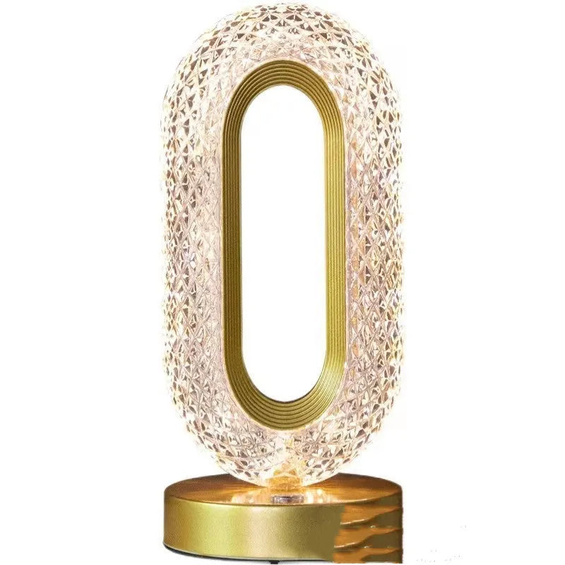 Modern minimalist O-shaped crystal desk lamp with touch dimming control on metal base
