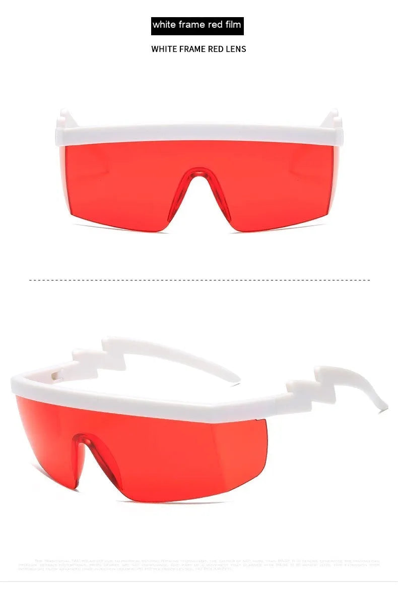 Black one-piece cycling sunglasses with blue polycarbonate lenses and lightning leg temples on a grey background.