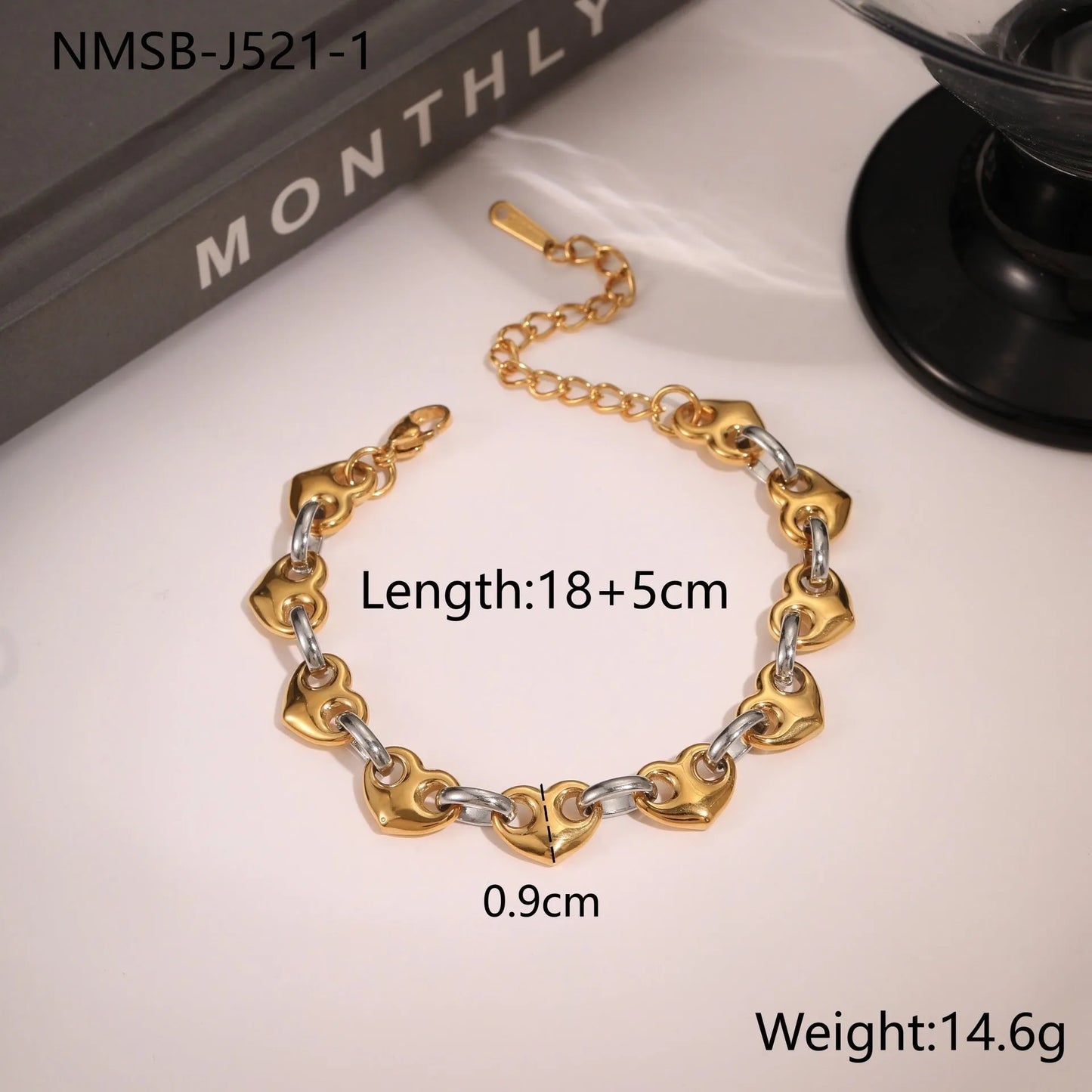 Women's hollow heart bracelet in stainless steel with 18K gold plating showing geometric design