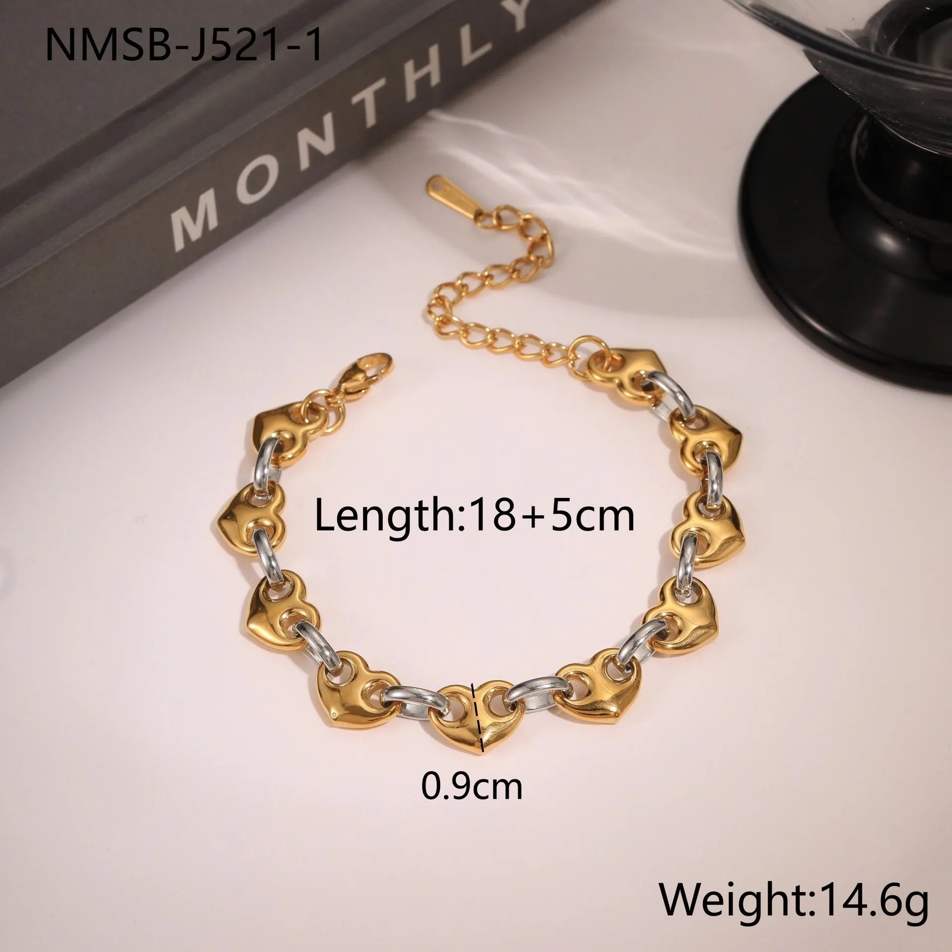 Women's hollow heart bracelet in stainless steel with 18K gold plating showing geometric design