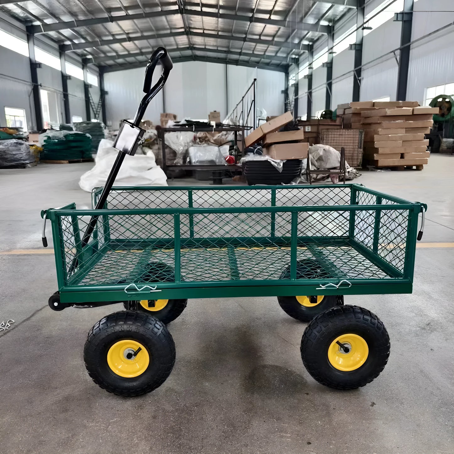 Green four-wheel hand push trolley with iron frame and terrain rubber wheels for 350kg load capacity