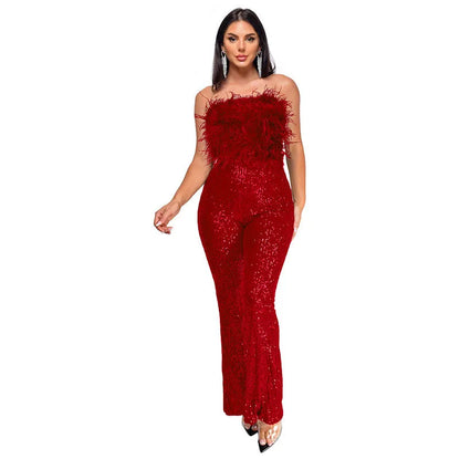 Women's sleeveless backless jumpsuit with flared legs in a wine red colour.