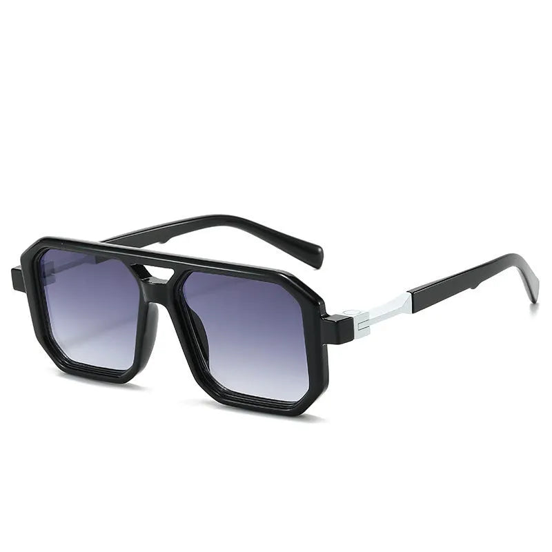 Retro style pilot sunglasses with a double beam metal frame and grey tinted lenses.