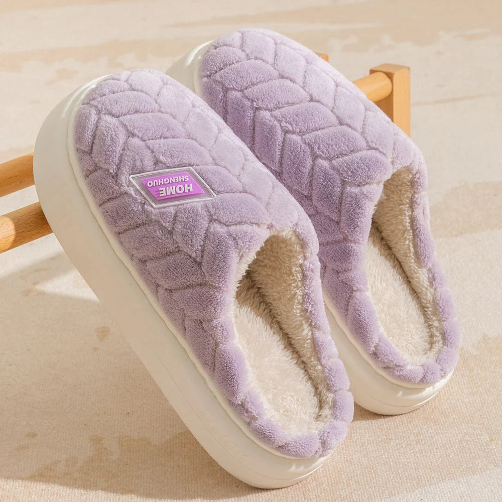 Cosy plush slippers with thick, non-slip soles and fleece lining, available in a variety of stylish colours