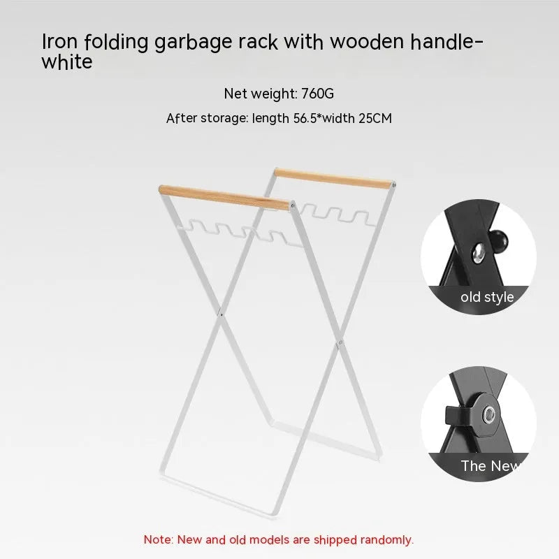 Black outdoor folding trash rack with wooden handle, holding a waste bag.