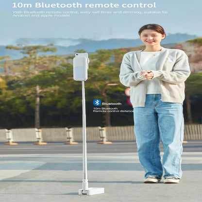 Pink floor-standing fill light with telescopic aluminium alloy stand and wireless remote for mobile phone live streaming.