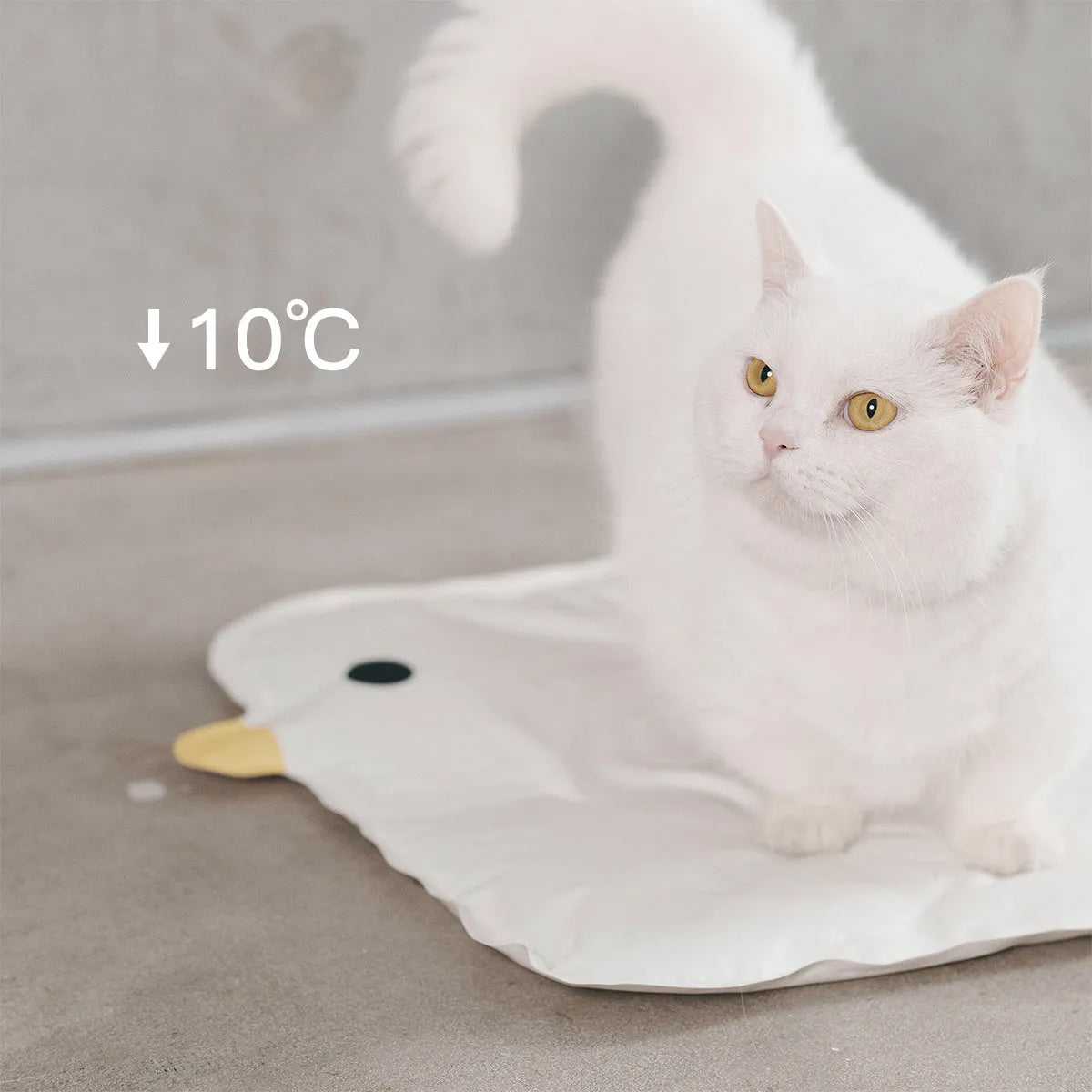 Washable chick-shaped pet cooling mat with non-stick surface for dogs and cats