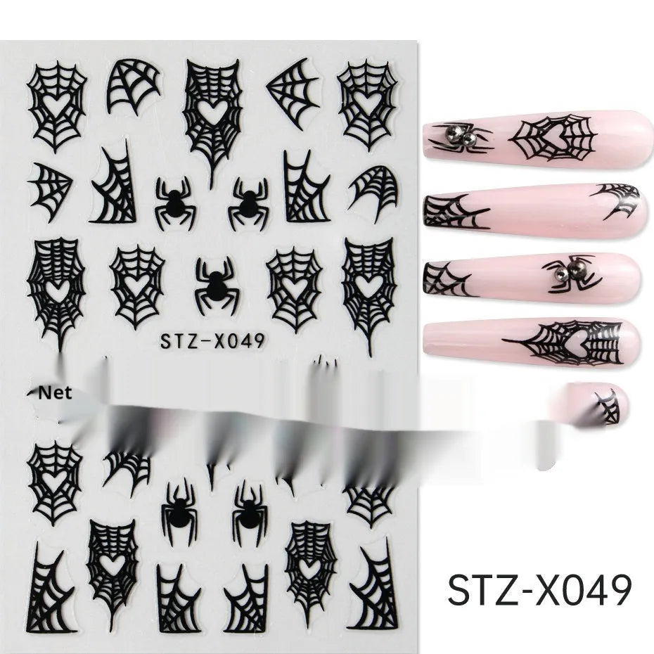 Assortment of black and silver nail sticker designs including cartoon and French tip patterns on a plastic sheet.