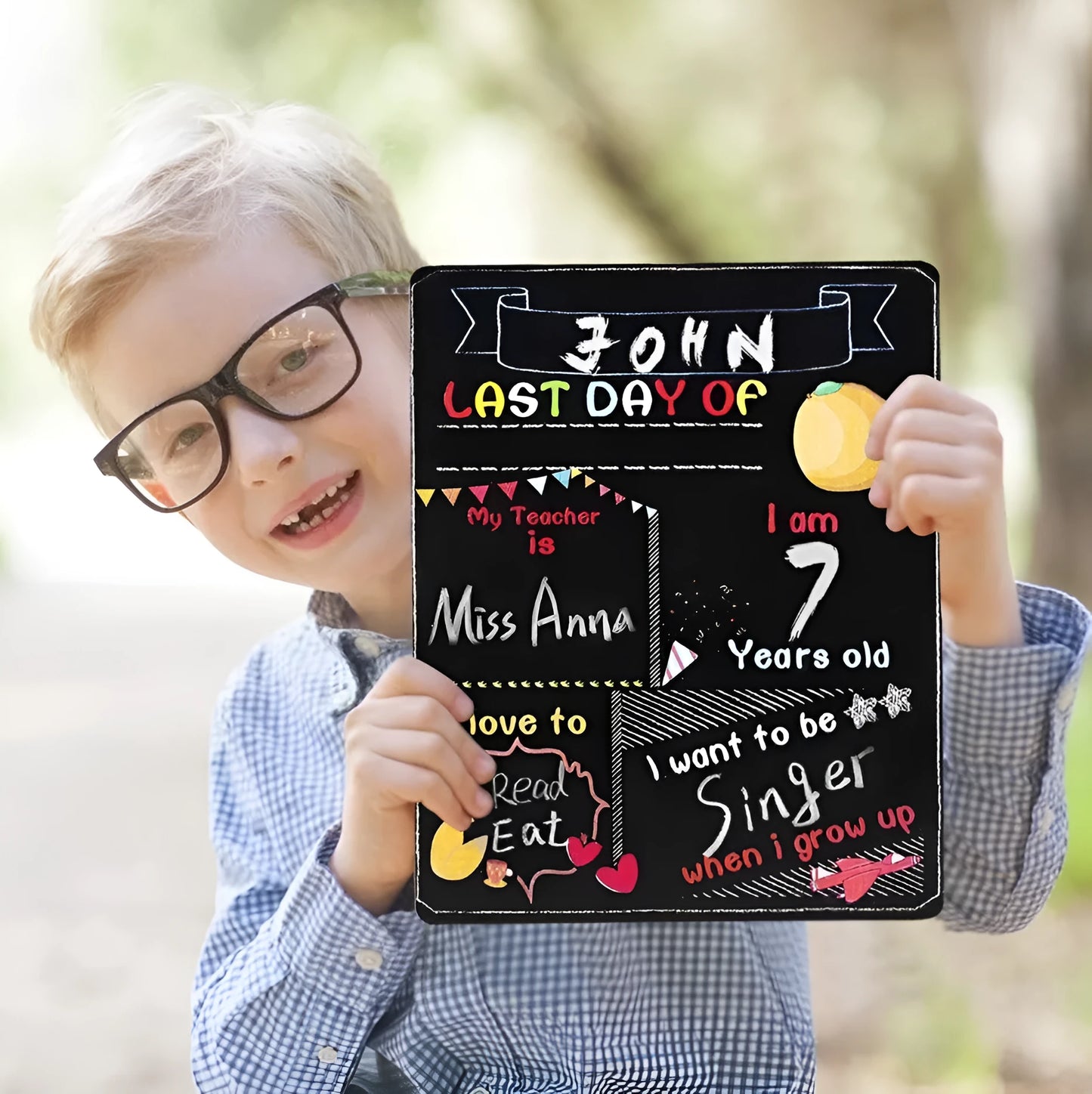 Wooden first day of school blackboard sign on a natural wood background.