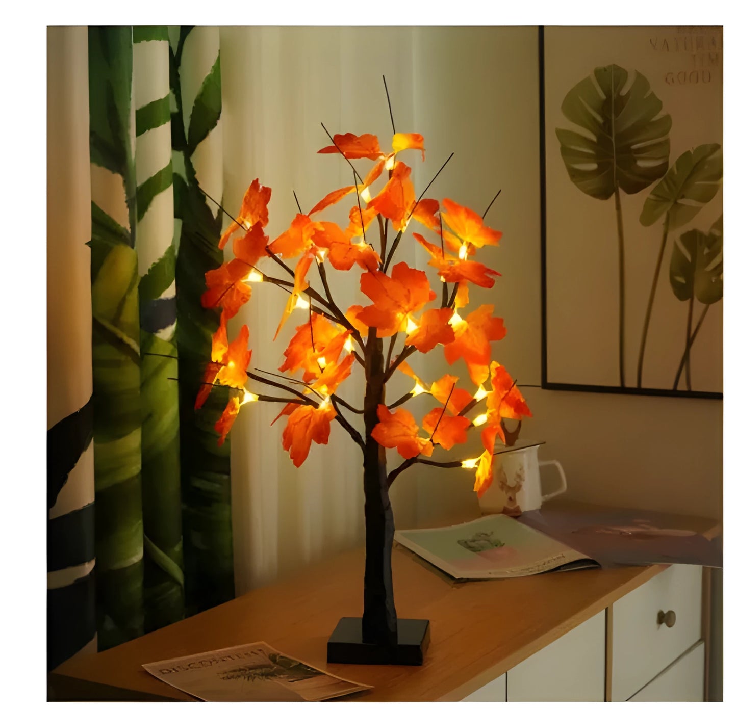 60cm tall white LED birch tree night light on a table, available in black, pumpkin, bat, or maple designs.