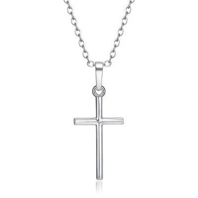 Elegant cross pendant necklace in gold and silver tones, a timeless British accessory