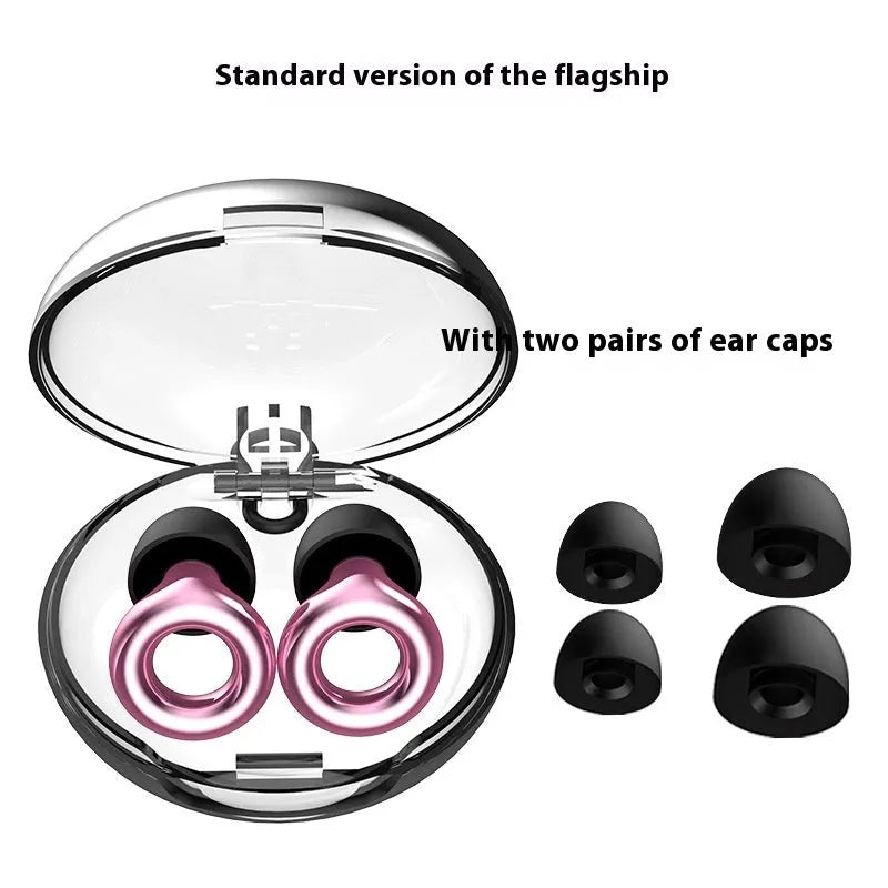 Set of gold-coloured noise reduction earplugs with a storage box and spare ear caps on a white background.
