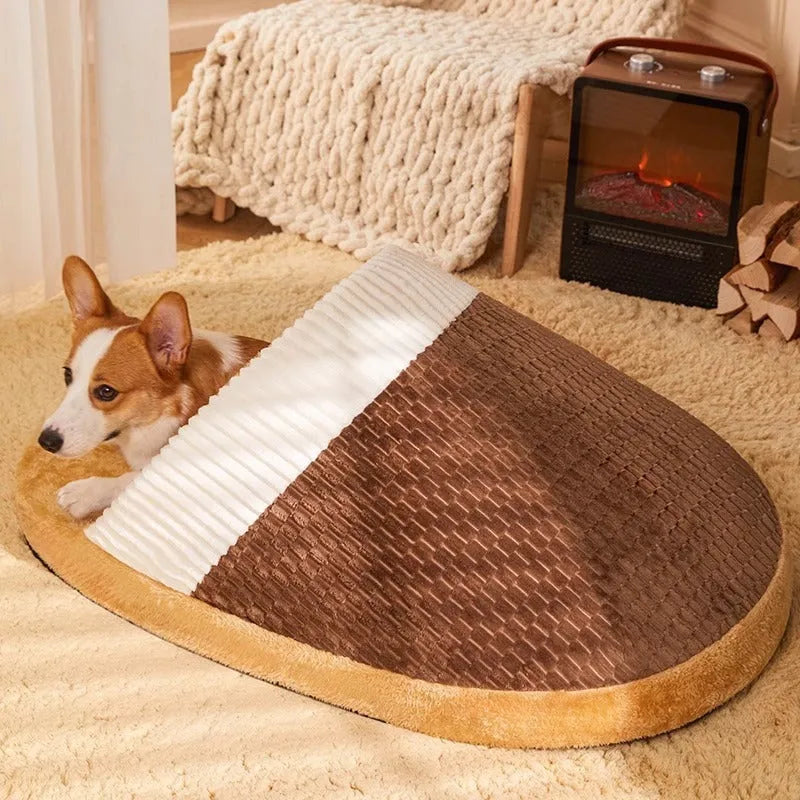 Blue foldable dog nest sleeping bag with removable fleece lining, shown unfolded on a floor.
