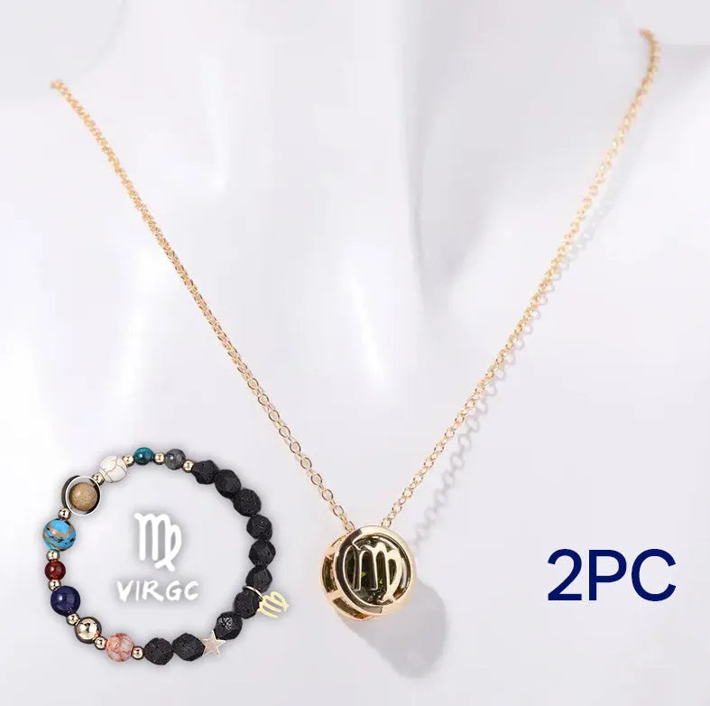 A natural stone beaded necklace and matching bracelet set laid flat, showcasing varied bead colours and textures.